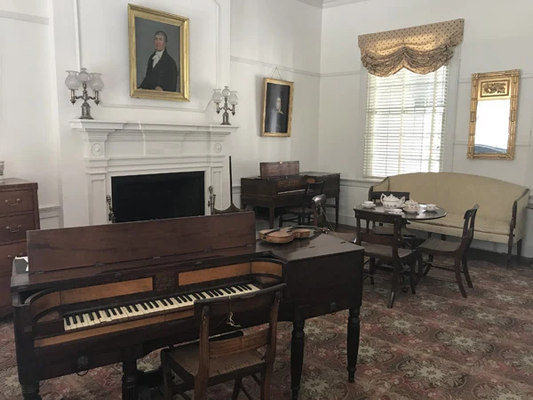 A first-floor room at McDowell House, furnished with period antiques