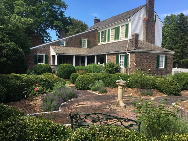 The detached kitchen and gardens at McDowell House Museum
